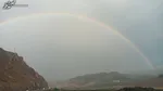 عکس/ رد رنگین‌کمان بر قله‌ی پوشیده‌ از ابرِ دماوند