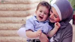 عکس/اين كودك را در آغوش مادر ببينيد
