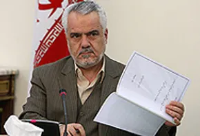 کاریکاتور/ بیمه معاون احمدی نژاد!