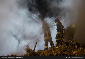 عکس/ برادر دوقلوی آتش‌نشان شهید