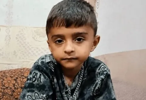 عکسی تلخ از پیکر کودک شهید حمله آمریکا به سیریک