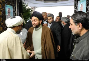 عکس/ ظریف در آغوش حداد عادل