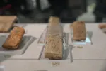 کشف جمجمه و بالا تنه کودک هخامنشی +تصاویر