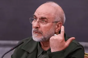 عکس/ خوش و بش خاصِ روحانی با قالی باف در مجلس