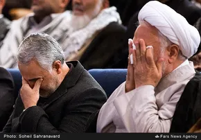 عکس/ پدرِ یک شهید مدافع حرم در کنار شهید باکری