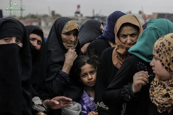توزیع مواد غذایی بین ساکنان غرب موصل