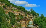 عکس| رونمایی از پرده رشتی‌دوزی ۲۰۰ ساله امام حسین (ع)