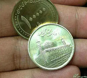 عکس/ دستخط روحانی برای سکه‌های جدید