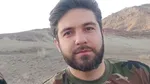 عکس/ وداع دختر ۲ساله شهید بهروز واحدی با پدرش