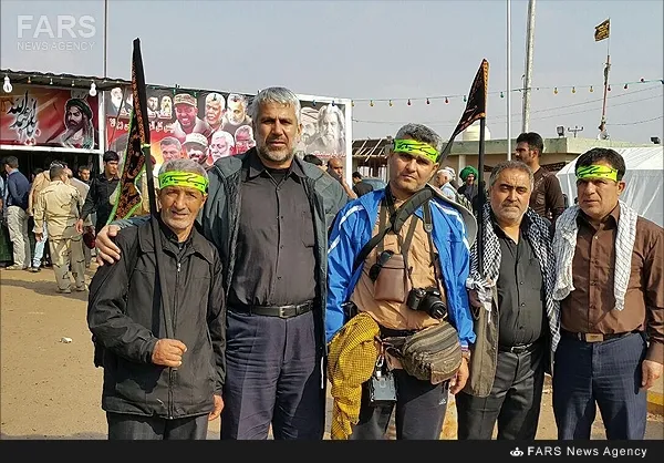  شهید مدافع حرم جواد دوربین (نفر دوم از سمت چپ تصویر)