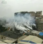 عکس/ بیرون آمدن گاوصندوق ۵تنی از زیر آوار پلاسکو