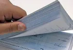 همتی:صدور چک از سال آینده سیستمی می‌شود