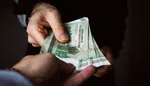 همتی: همین امروز و فردا قیمت ارز را پایین می‌آوریم
